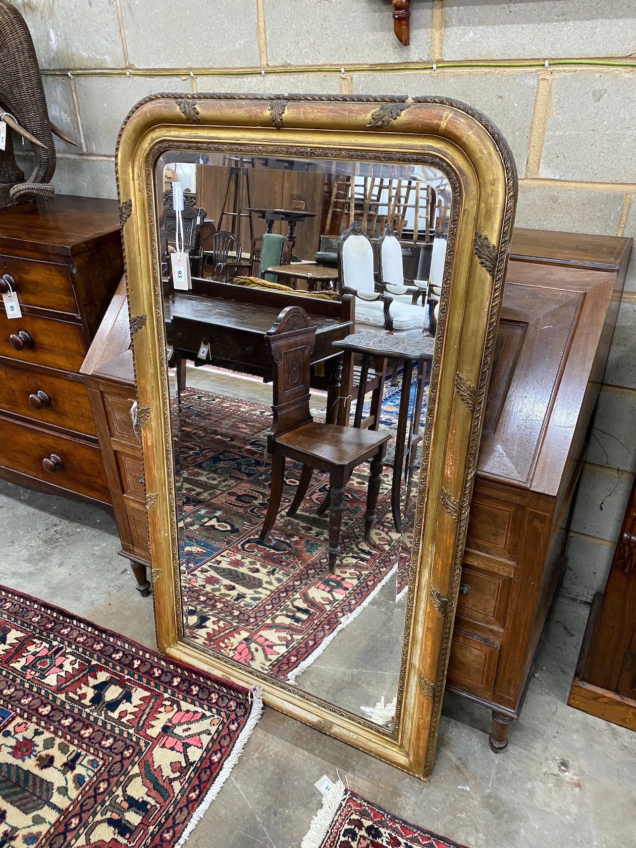 A 19th century French giltwood and composition wall mirror, width 79cm, height 140cm